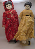 Two China Head Dolls.