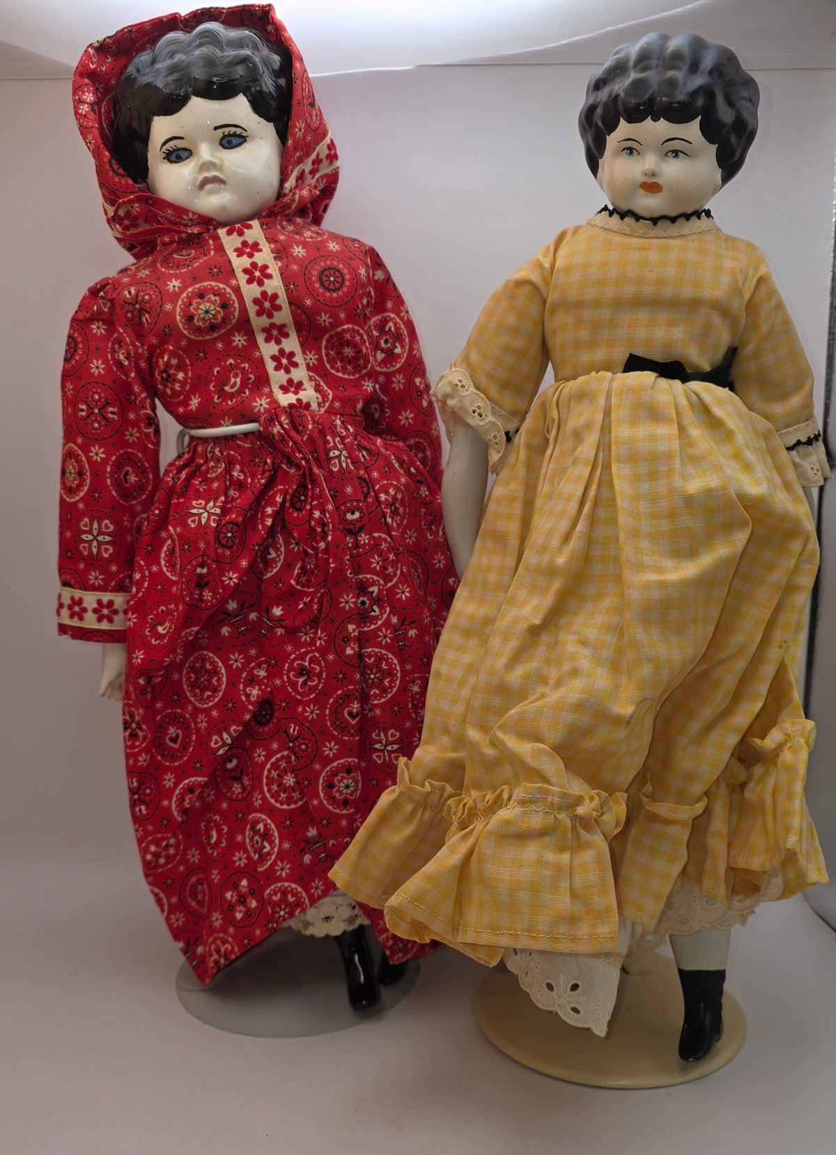 Two China Head Dolls.
